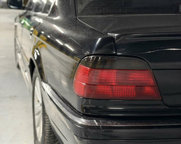 Черный БМВ 7 Серия, объемом двигателя 4.4 л и пробегом 450 тыс. км за 4500 $, фото 11 на Automoto.ua