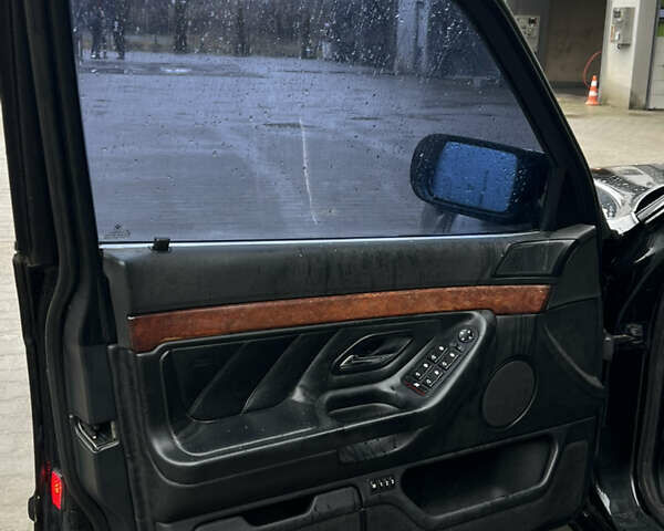 Черный БМВ 7 Серия, объемом двигателя 4.4 л и пробегом 400 тыс. км за 5499 $, фото 10 на Automoto.ua