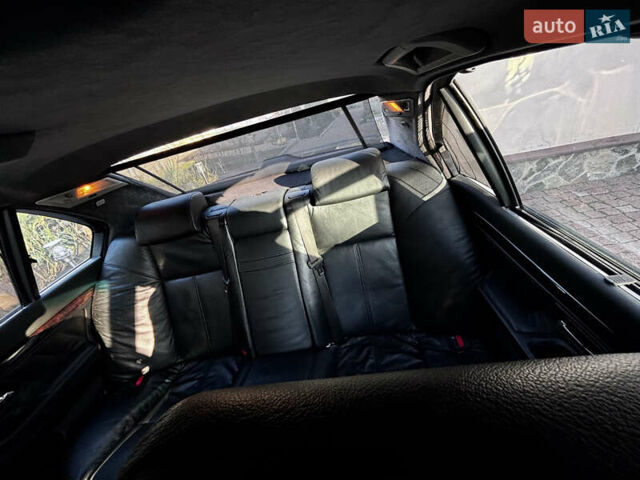 Черный БМВ 7 Серия, объемом двигателя 3.5 л и пробегом 370 тыс. км за 12000 $, фото 11 на Automoto.ua