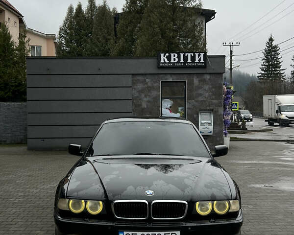 Черный БМВ 7 Серия, объемом двигателя 4.4 л и пробегом 400 тыс. км за 5499 $, фото 1 на Automoto.ua