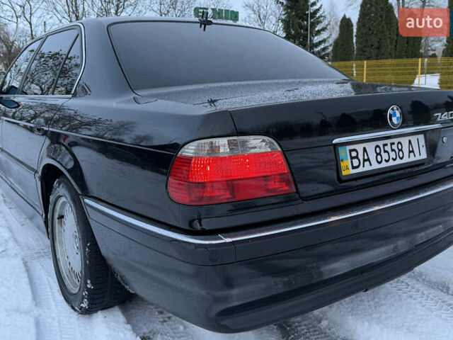 Чорний БМВ 7 Серія, об'ємом двигуна 4.4 л та пробігом 409 тис. км за 9200 $, фото 4 на Automoto.ua