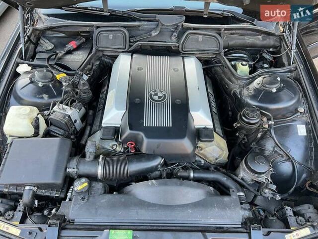 Черный БМВ 7 Серия, объемом двигателя 3.5 л и пробегом 370 тыс. км за 12000 $, фото 4 на Automoto.ua