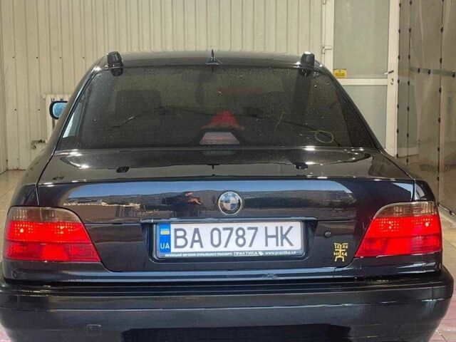 Черный БМВ 7 Серия, объемом двигателя 3.5 л и пробегом 523 тыс. км за 5800 $, фото 1 на Automoto.ua