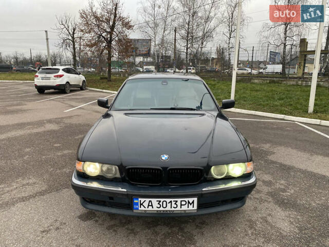 Черный БМВ 7 Серия, объемом двигателя 3.5 л и пробегом 300 тыс. км за 3300 $, фото 1 на Automoto.ua