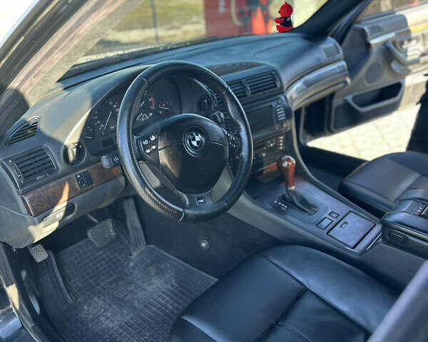 Чорний БМВ 7 Серія, об'ємом двигуна 3.5 л та пробігом 530 тис. км за 7700 $, фото 10 на Automoto.ua