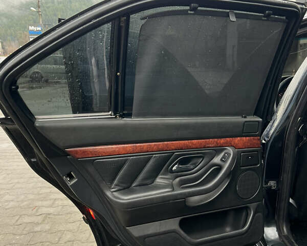 Черный БМВ 7 Серия, объемом двигателя 4.4 л и пробегом 400 тыс. км за 5499 $, фото 15 на Automoto.ua