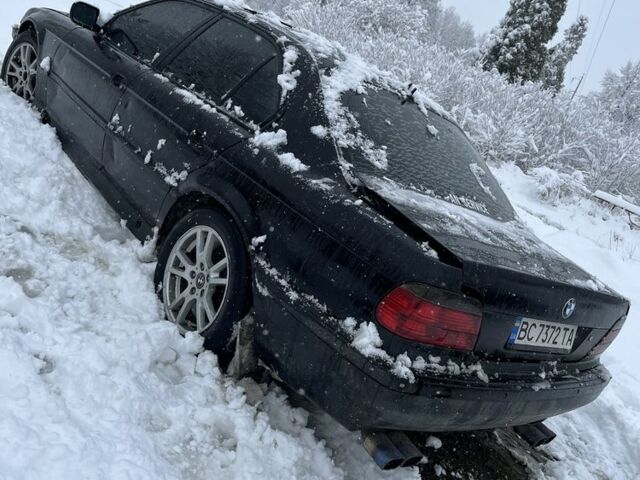 Черный БМВ 7 Серия, объемом двигателя 4.4 л и пробегом 300 тыс. км за 2900 $, фото 1 на Automoto.ua