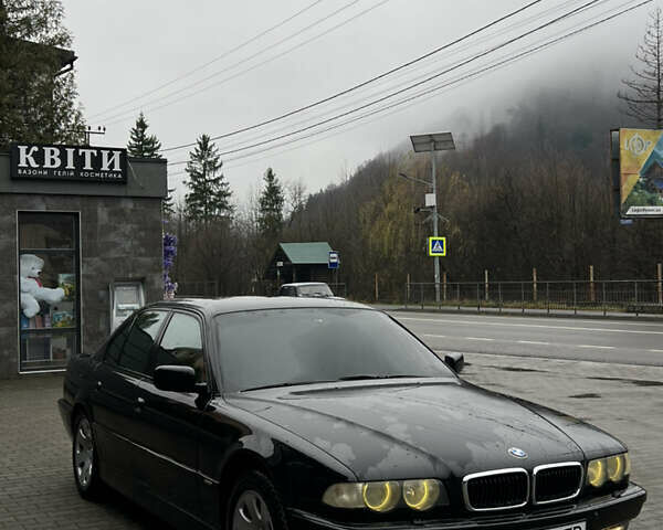 Черный БМВ 7 Серия, объемом двигателя 4.4 л и пробегом 400 тыс. км за 5499 $, фото 2 на Automoto.ua