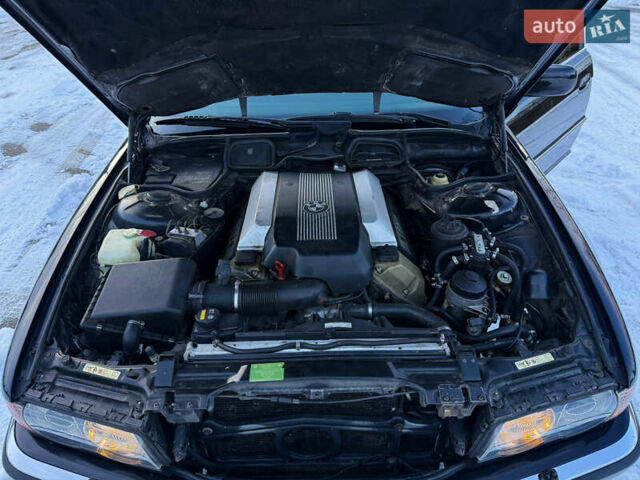 Чорний БМВ 7 Серія, об'ємом двигуна 4.4 л та пробігом 409 тис. км за 9200 $, фото 38 на Automoto.ua