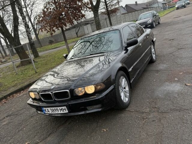 Черный БМВ 7 Серия, объемом двигателя 4.4 л и пробегом 380 тыс. км за 1999 $, фото 4 на Automoto.ua