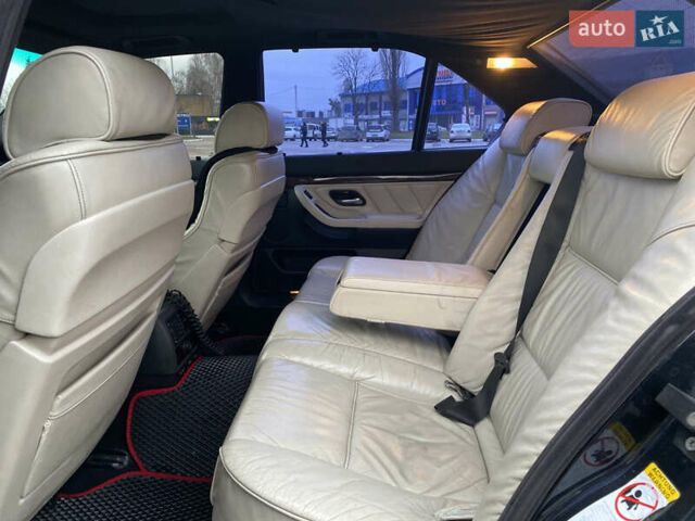 Черный БМВ 7 Серия, объемом двигателя 3.5 л и пробегом 300 тыс. км за 3300 $, фото 16 на Automoto.ua