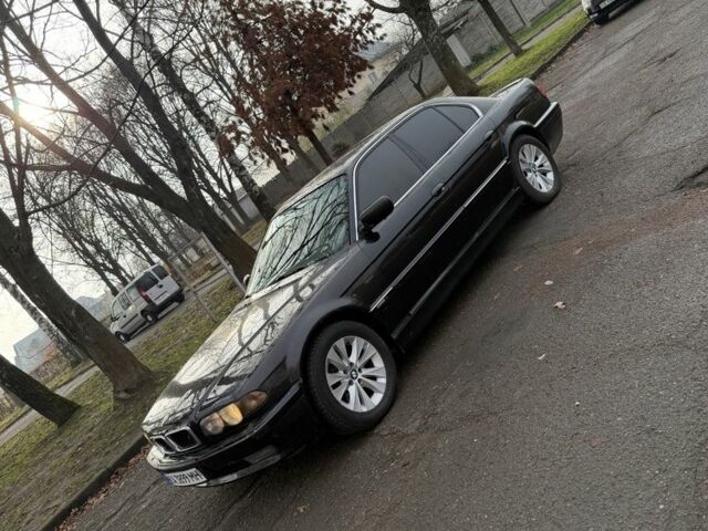 Черный БМВ 7 Серия, объемом двигателя 4.4 л и пробегом 380 тыс. км за 1999 $, фото 6 на Automoto.ua