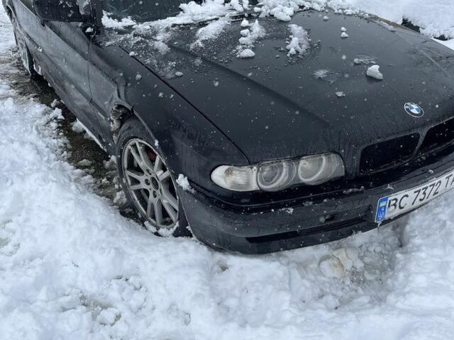 Черный БМВ 7 Серия, объемом двигателя 4.4 л и пробегом 300 тыс. км за 2900 $, фото 5 на Automoto.ua