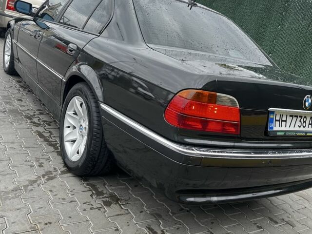 Черный БМВ 7 Серия, объемом двигателя 3.9 л и пробегом 298 тыс. км за 6200 $, фото 1 на Automoto.ua