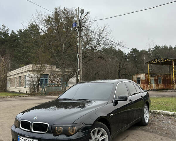 Черный БМВ 7 Серия, объемом двигателя 4.4 л и пробегом 358 тыс. км за 4599 $, фото 2 на Automoto.ua