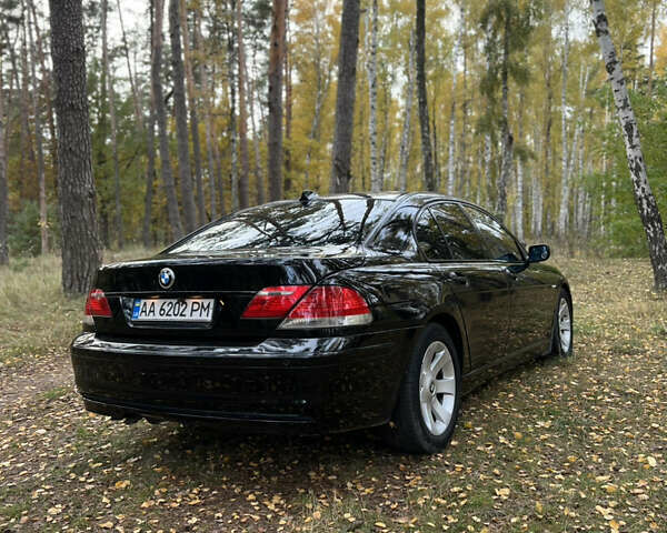 Черный БМВ 7 Серия, объемом двигателя 3.5 л и пробегом 460 тыс. км за 5300 $, фото 3 на Automoto.ua