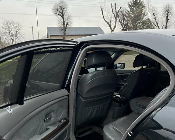 Черный БМВ 7 Серия, объемом двигателя 4.4 л и пробегом 358 тыс. км за 4599 $, фото 15 на Automoto.ua