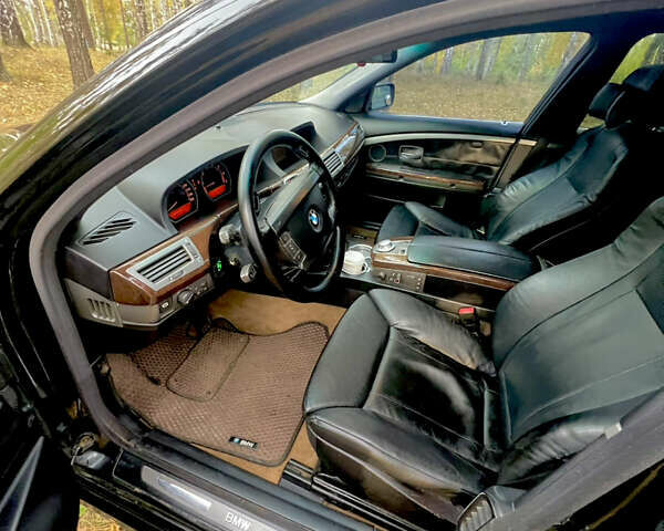 Черный БМВ 7 Серия, объемом двигателя 3.5 л и пробегом 460 тыс. км за 5200 $, фото 8 на Automoto.ua