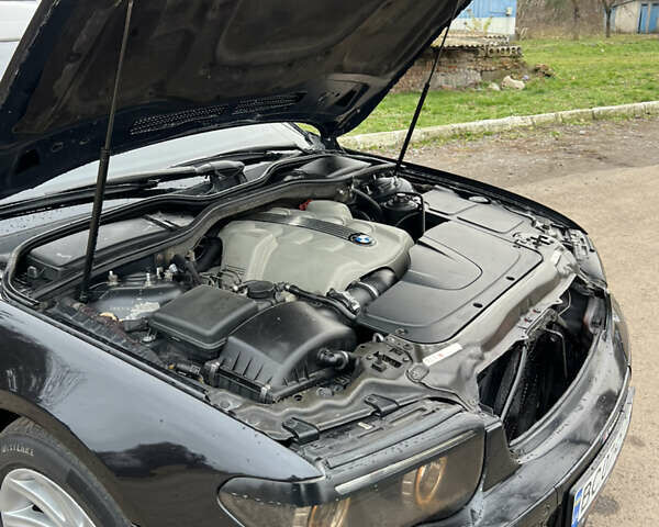 Черный БМВ 7 Серия, объемом двигателя 4.4 л и пробегом 358 тыс. км за 4599 $, фото 35 на Automoto.ua