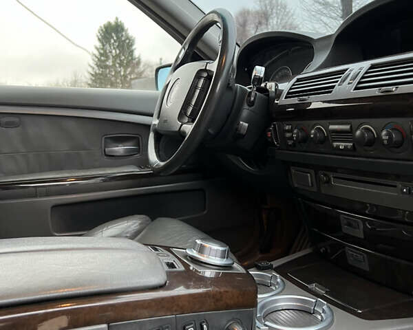 Черный БМВ 7 Серия, объемом двигателя 4.4 л и пробегом 358 тыс. км за 4599 $, фото 22 на Automoto.ua
