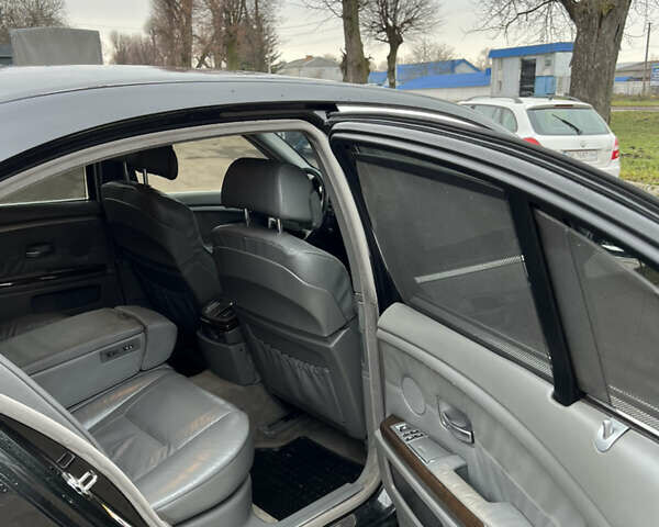 Черный БМВ 7 Серия, объемом двигателя 4.4 л и пробегом 358 тыс. км за 4599 $, фото 18 на Automoto.ua