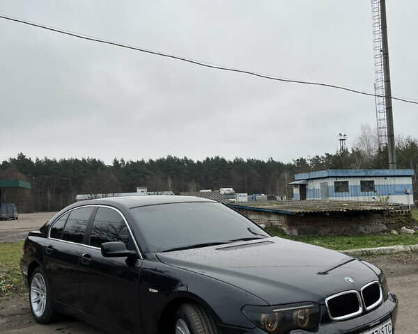Черный БМВ 7 Серия, объемом двигателя 4.4 л и пробегом 358 тыс. км за 4599 $, фото 9 на Automoto.ua