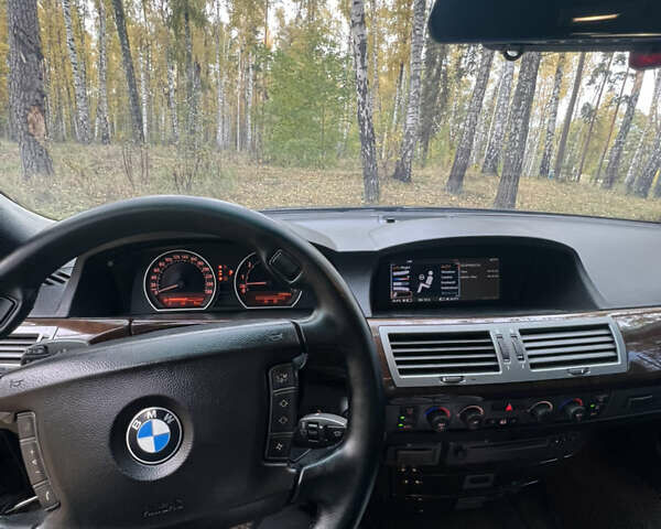 Черный БМВ 7 Серия, объемом двигателя 3.5 л и пробегом 460 тыс. км за 5300 $, фото 11 на Automoto.ua