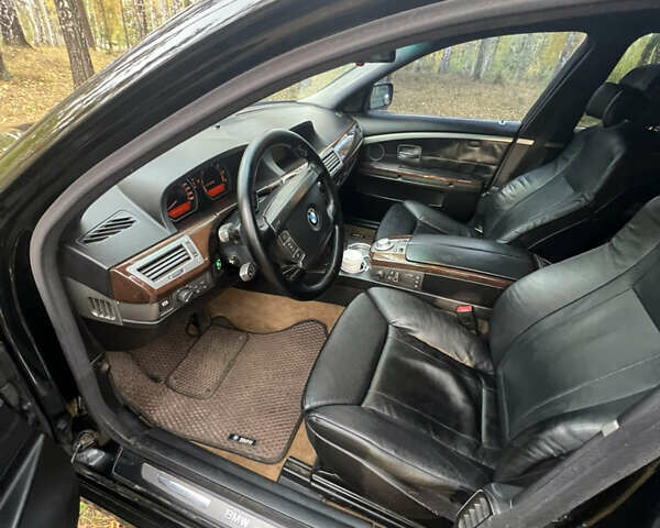 Черный БМВ 7 Серия, объемом двигателя 3.5 л и пробегом 460 тыс. км за 5300 $, фото 6 на Automoto.ua
