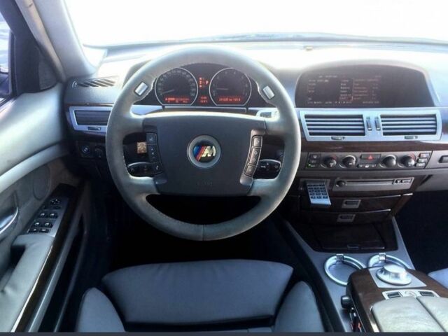 Черный БМВ 7 Серия, объемом двигателя 4.5 л и пробегом 280 тыс. км за 5400 $, фото 2 на Automoto.ua