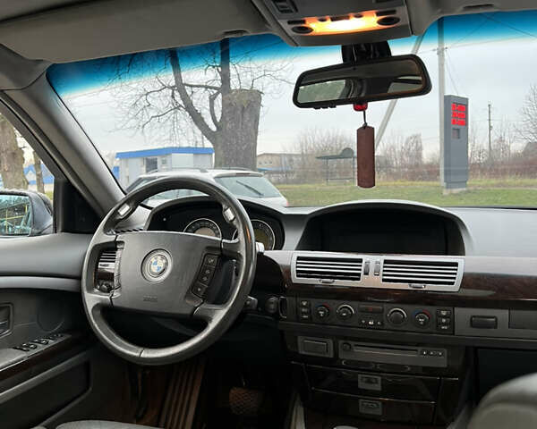 Черный БМВ 7 Серия, объемом двигателя 4.4 л и пробегом 358 тыс. км за 4599 $, фото 25 на Automoto.ua