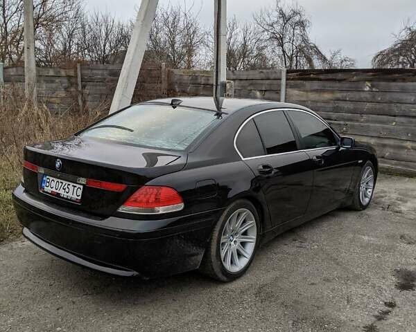 Черный БМВ 7 Серия, объемом двигателя 4.4 л и пробегом 350 тыс. км за 5000 $, фото 11 на Automoto.ua