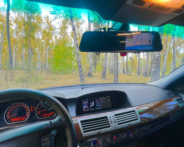 Черный БМВ 7 Серия, объемом двигателя 3.5 л и пробегом 460 тыс. км за 5200 $, фото 6 на Automoto.ua