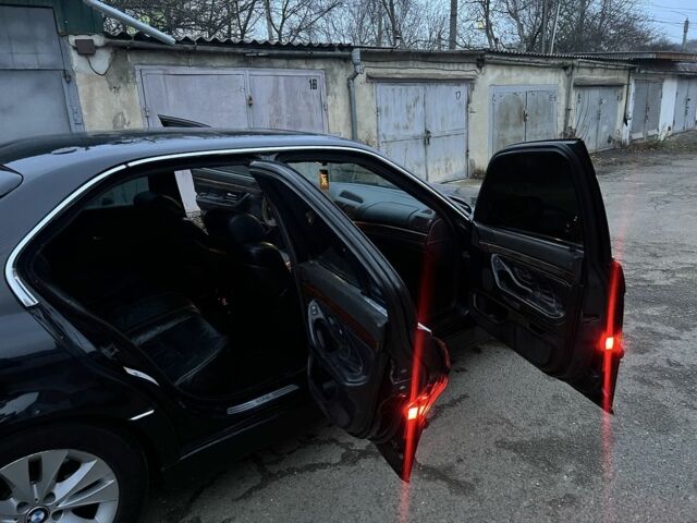 Черный БМВ 7 Серия, объемом двигателя 4.4 л и пробегом 300 тыс. км за 3650 $, фото 5 на Automoto.ua