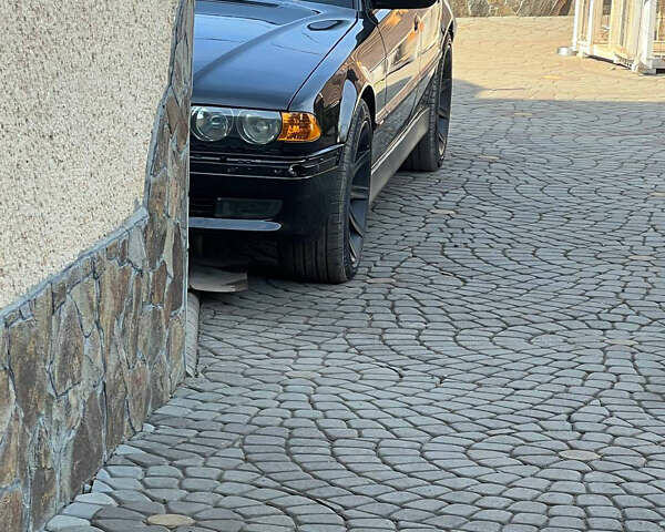 Черный БМВ 7 Серия, объемом двигателя 4.4 л и пробегом 380 тыс. км за 5000 $, фото 4 на Automoto.ua