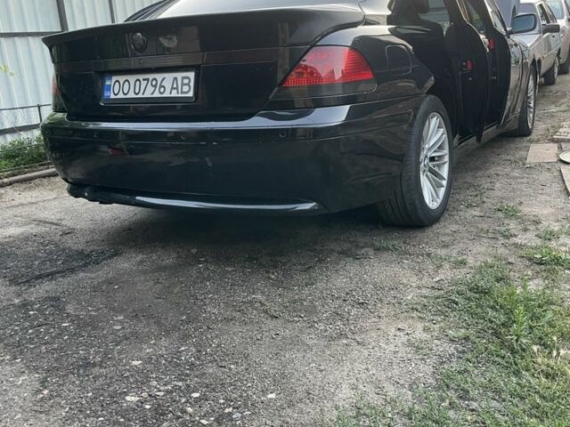 Черный БМВ 7 Серия, объемом двигателя 4.5 л и пробегом 280 тыс. км за 5400 $, фото 3 на Automoto.ua