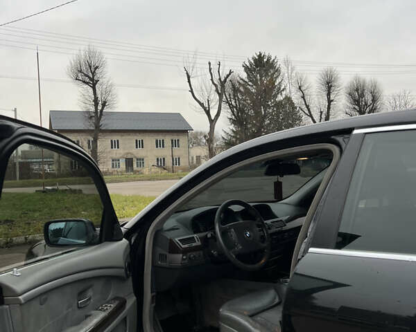 Черный БМВ 7 Серия, объемом двигателя 4.4 л и пробегом 358 тыс. км за 4599 $, фото 10 на Automoto.ua