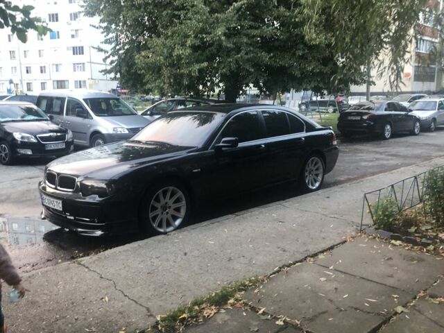 Черный БМВ 7 Серия, объемом двигателя 4.4 л и пробегом 356 тыс. км за 5199 $, фото 1 на Automoto.ua
