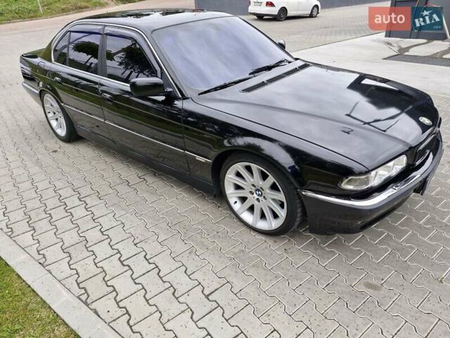 Черный БМВ 7 Серия, объемом двигателя 3.5 л и пробегом 320 тыс. км за 6300 $, фото 2 на Automoto.ua