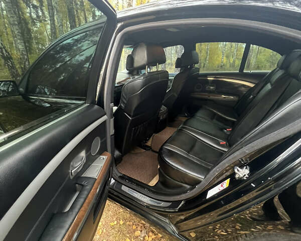 Черный БМВ 7 Серия, объемом двигателя 3.5 л и пробегом 460 тыс. км за 5300 $, фото 8 на Automoto.ua