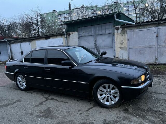 Черный БМВ 7 Серия, объемом двигателя 4.4 л и пробегом 300 тыс. км за 3650 $, фото 6 на Automoto.ua