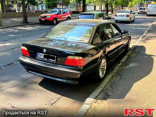 Чорний БМВ 7 Серія, об'ємом двигуна 4.4 л та пробігом 400 тис. км за 8300 $, фото 2 на Automoto.ua