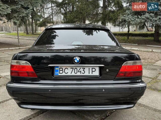 Черный БМВ 7 Серия, объемом двигателя 3 л и пробегом 380 тыс. км за 7300 $, фото 3 на Automoto.ua