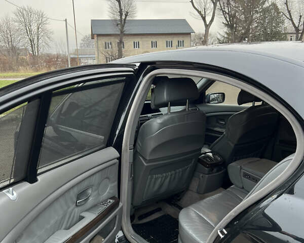 Черный БМВ 7 Серия, объемом двигателя 4.4 л и пробегом 358 тыс. км за 4599 $, фото 14 на Automoto.ua