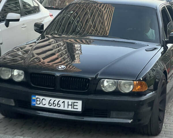 Черный БМВ 7 Серия, объемом двигателя 4.4 л и пробегом 380 тыс. км за 5000 $, фото 7 на Automoto.ua