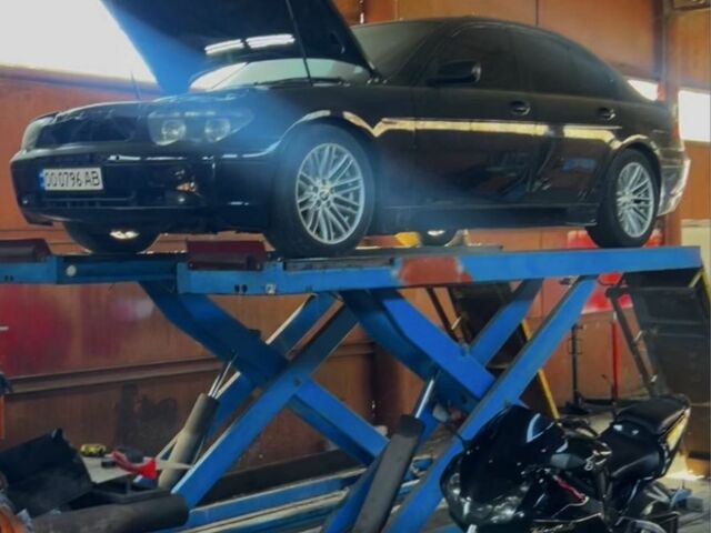 Черный БМВ 7 Серия, объемом двигателя 4.5 л и пробегом 280 тыс. км за 5400 $, фото 4 на Automoto.ua