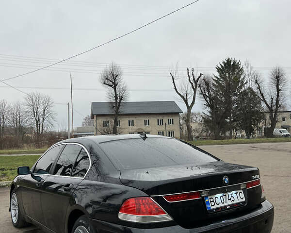 Черный БМВ 7 Серия, объемом двигателя 4.4 л и пробегом 358 тыс. км за 4599 $, фото 5 на Automoto.ua