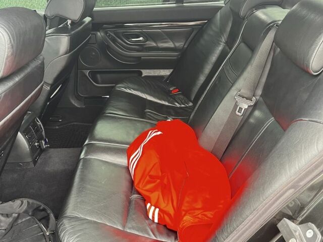 Черный БМВ 7 Серия, объемом двигателя 3.9 л и пробегом 298 тыс. км за 6200 $, фото 7 на Automoto.ua