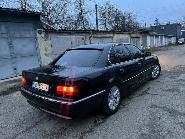 Черный БМВ 7 Серия, объемом двигателя 4.4 л и пробегом 300 тыс. км за 3650 $, фото 1 на Automoto.ua