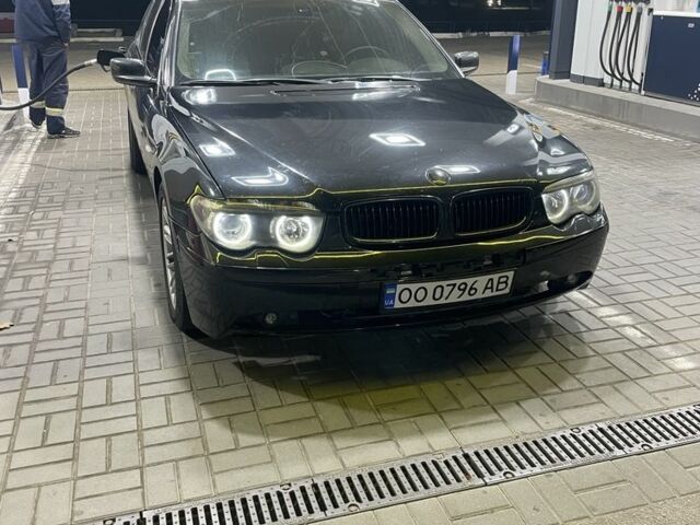 Черный БМВ 7 Серия, объемом двигателя 4.5 л и пробегом 280 тыс. км за 5400 $, фото 1 на Automoto.ua
