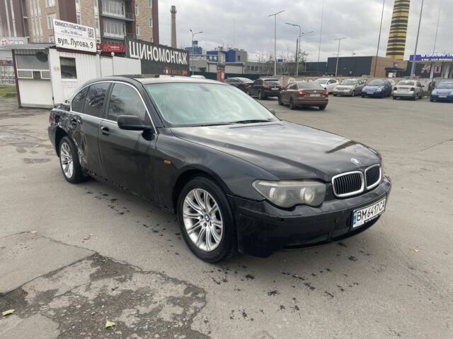 Черный БМВ 7 Серия, объемом двигателя 4.4 л и пробегом 320 тыс. км за 4000 $, фото 1 на Automoto.ua